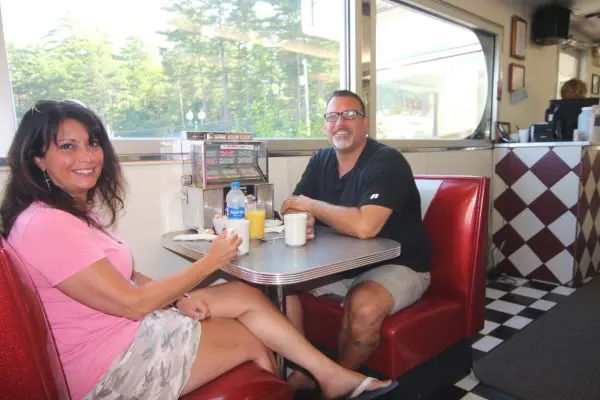 Patrons sitting inside in our booths